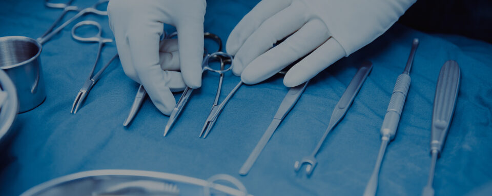 Hand with surgical equipment